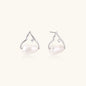 Silver mountain outline studs with baroque pearl and diamond accent on white background