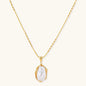 18K gold-plated sterling silver necklace with alternating bead chain and baroque pearl pendant on neutral background.